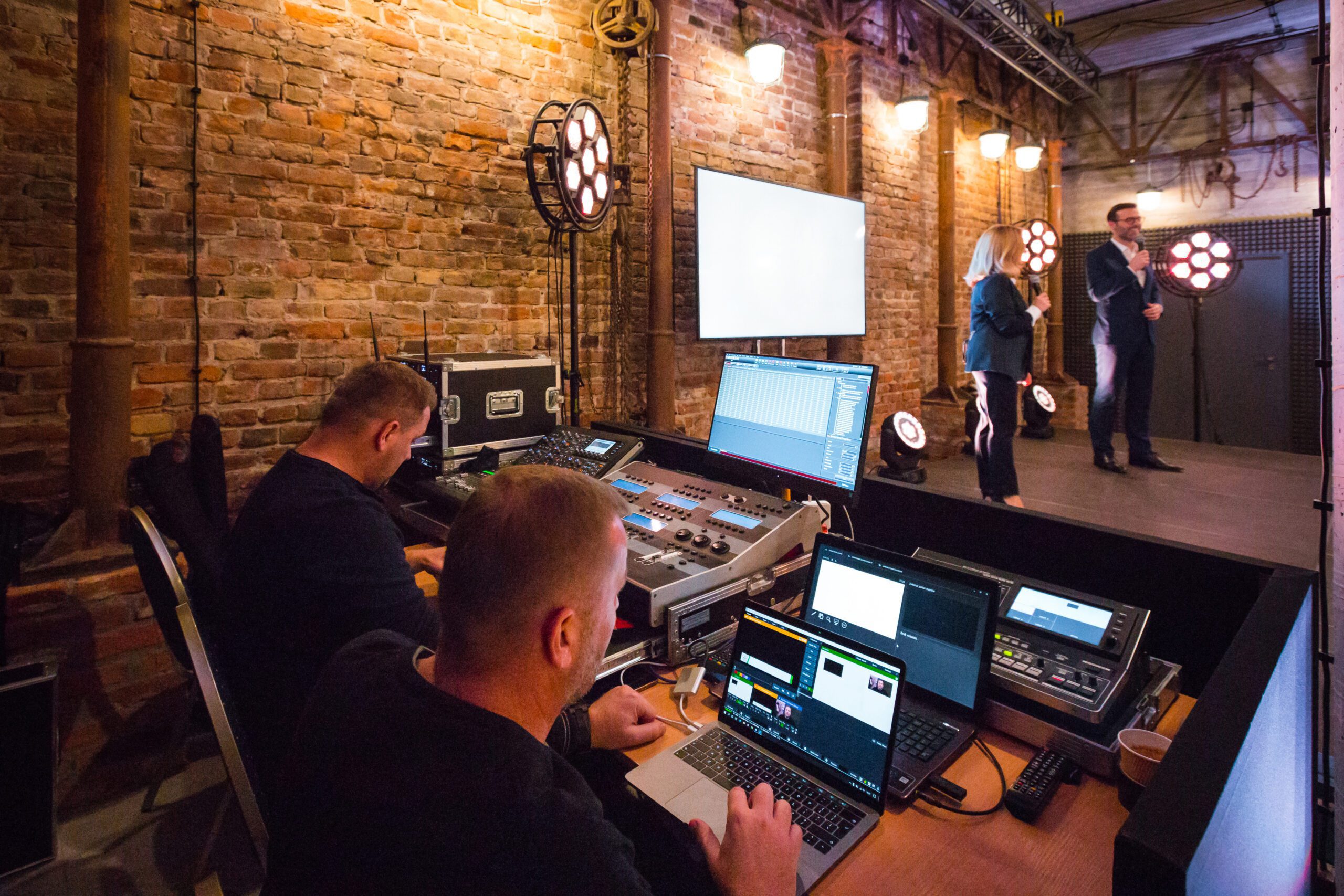 Event control room with people and equipment.