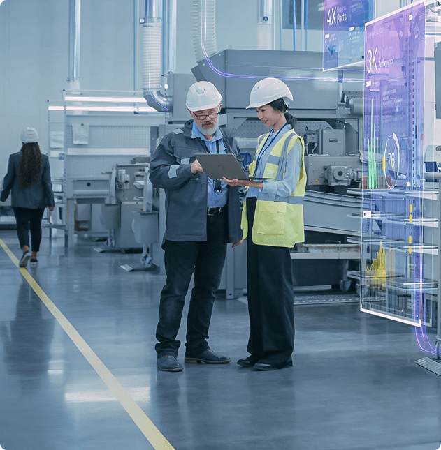 Engineers discussing in modern industrial facility.