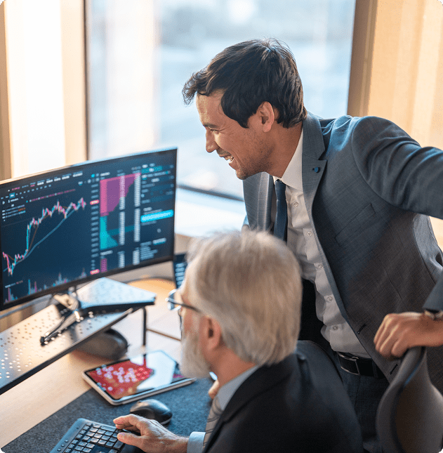 Two businessmen analyzing stock market data.